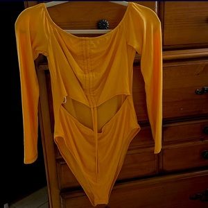 Orange body suit